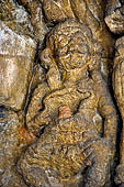 Udaigiri Cave 1 Rani Gumpha Queen's Cave - decorations of the three doorways of the veranda of the left wing of the ground floor. Detail of the first tableau (from left).