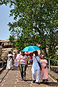 Orissa - Bhubaneswar. People visiting Udaigiri cave. 