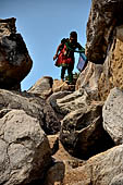 Orissa - Bhubaneswar. People visiting Udaigiri cave. 