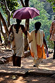 Orissa - Bhubaneswar. People visiting Udaigiri cave. 