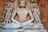 Udayagiri - Maha Stupa. Inside one of the four niches Abhisambhodi - Vairocana flanked by Manjusri and Kisitigarbha.