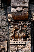 Udayagiri - Monastery n1. Decoration detail of the richly carved doorframe of the sanctum. 