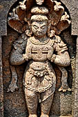 Udayagiri - Monastery n1. Decoration detail of the richly carved doorframe of the sanctum. Dvarapalas. 