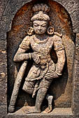 Udayagiri - Monastery n1. Decoration detail of the richly carved doorframe of the sanctum. Dvarapalas. 