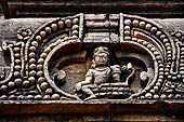 Udayagiri - Monastery n1. Decoration detail of the richly carved doorframe of the sanctum. 