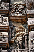 Udayagiri - Monastery n1. Decoration detail of the richly carved doorframe of the sanctum. 