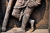 Udayagiri - Monastery n1. Decoration detail of the richly carved doorframe of the sanctum. Dvarapalas. 