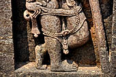 Udayagiri - Monastery n1. Decoration detail of the richly carved doorframe of the sanctum. Dvarapalas. 