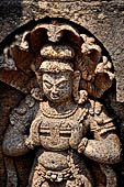 Udayagiri - Monastery n1. Decoration detail of the richly carved doorframe of the sanctum. Dvarapalas. 