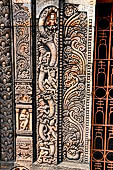 Udayagiri - Monastery n1. Decoration detail of the richly carved doorframe of the sanctum. 