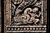 Udayagiri - Monastery n1. Decoration detail of the richly carved doorframe of the sanctum. 