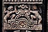 Udayagiri - Monastery n1. Decoration detail of the richly carved doorframe of the sanctum. 