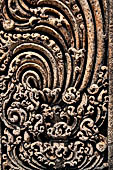 Udayagiri - Monastery n1. Decoration detail of the richly carved doorframe of the sanctum. 