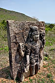 Udayagiri - four-armed Avalokitesvara statue in the field near the Monastery n 1. 