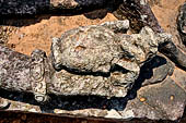 Udayagiri - Udayagiri II excavations. Detail of the four-armed Avalokitesvara statue in the field near the Monastery n 2. 