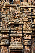 Orissa - Bhubaneswar. Vaital deul, detail of the south face of the deul, the chaitya medallion shows the image of Lakulisa and below Uma-mahesvara panel.