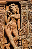 Orissa - Bhubaneswar. Vaital deul, west face of the deul. Details of the lateral panel with beautiful female figure. 