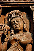 Orissa - Bhubaneswar. Vaital deul, west face of the deul. Details of the lateral panel with beautiful female figure. 