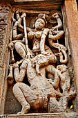 Orissa - Bhubaneswar. Vaital deul, detail of the panel on the north face of the deul: Durga killing the demon with  buffalo head. 