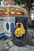 Orissa - The village of Hirapur. Small Shiva Temple with a panel depicting Krishna as the divine flute player (venu gopala). 