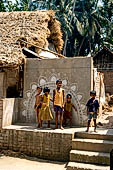 Orissa - village near Raghurajpur. House walls are painted with auspicious diagrams made with white rice paste. 