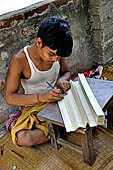 Orissa - craft house in a village near Raghurajpur. Etching on palmleaf. 