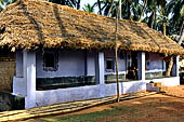 Orissa - village near Raghurajpur. Houses are usually lined at the sides of the village only road. 