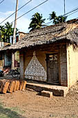 Orissa - traditional Brahmin villages near Puri. Wall painting made with white rice paste. 