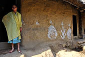 Orissa - traditional Brahmin villages near Puri. House walls are painted with auspicious diagrams made with white rice paste. 