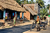 Orissa - traditional Brahmin villages near Puri. Houses lined along the single road traversing the village. 