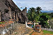 Aluvihara cave temples - The caves temples linked by flights of steps and narrow paths in a jumble of massive rock boulders.