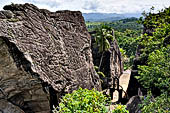 Aluvihara cave temples - The caves temples linked by flights of steps and narrow paths in a jumble of massive rock boulders.