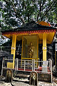 Aluvihara cave temples - statue of the Indian Buddhist scholar Buddhaghosa donated by Thailand in commemoration of his service to the Buddhism.