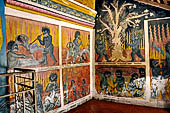 Aluvihara cave temples - Cave 2. Paintings of the cave entrance. Wall Paintings of the Buddhist hell.