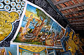 Aluvihara cave temples - Cave 1. Details of the paintings of the cave entrance.