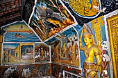 Aluvihara cave temples - Cave 1. Details of the paintings of the cave entrance.