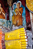 Aluvihara cave temples - Cave 1. Detail of the reclining Buddha statue.