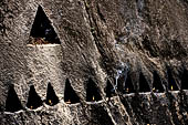 Aluvihara cave temples - Cavities in the rock boulders for oil lamps.