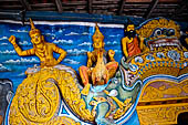 Aluvihara cave temples - Cave 1. The cave entrance. Detail of the entrance torana with Brahma riding a goose.