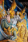 Aluvihara cave temples - Cave 1. The cave entrance. Detail of the entrance torana with Indra riding his elephant.