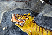 Aluvihara cave temples - Cave 1. Details of the paintings of the cave entrance.