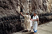 Aluvihara cave temples - Cavities in the rock for oil lamps.