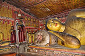 Dambulla cave temples - Cave 3, Maha Alut Viharaya (Great New Temple), reclining  Buddha carved out of solid rock. 