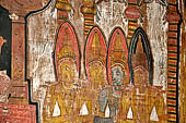 Dambulla cave temples - Cave 3, Maha Alut Viharaya (Great New Temple), paintings of the ceiling show the future Buddha, Maitreya, preaching in a Kandyan-looking pavilion to a group of splendidly adorned gods.