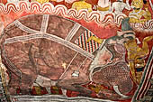 Dambulla cave temples - Cave 2, Maharaja Vihara (Temple of the Great Kings) panels of the Mara Parajaya (Defeat of Mara): first panel detail of  Mara riding an elephant.