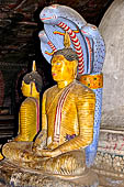 Dambulla cave temples - Cave 2, Maharaja Vihara (Temple of the Great Kings) mucalinda naga Buddha.