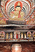 Dambulla cave temples - Cave 2, Maharaja Vihara (Temple of the Great Kings) panels of the Mara Parajaya (Defeat of Mara): the third panel shows the Isipatana: Buddha seated in the vitarka mudra gives the first sermon to an assembly of gods.