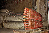 Dambulla cave temples - Cave 2, Maharaja Vihara (Temple of the Great Kings) detail of the statue of the reclining Buddha. 