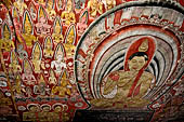 Dambulla cave temples - Cave 2, Maharaja Vihara (Temple of the Great Kings) panels of the Mara Parajaya (Defeat of Mara): the third panel shows the Isipatana: Buddha seated in the vitarka mudra gives the first sermon to an assembly of gods.