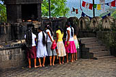 Dambulla cave. People offering to the bho tree.